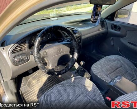 Бежевый Дэу Ланос, объемом двигателя 1.5 л и пробегом 186 тыс. км за 2750 $, фото 9 на Automoto.ua