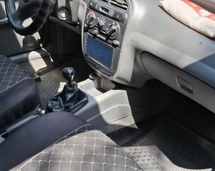 Бежевий Деу Ланос, об'ємом двигуна 1.5 л та пробігом 238 тис. км за 2200 $, фото 13 на Automoto.ua