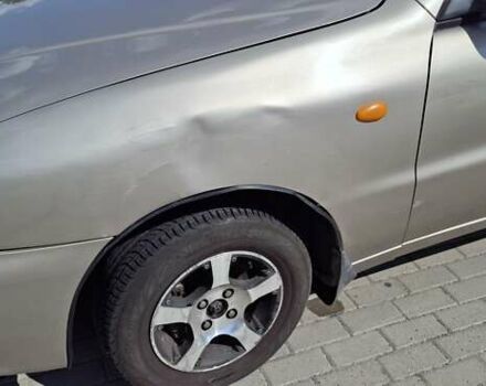 Бежевий Деу Ланос, об'ємом двигуна 1.5 л та пробігом 238 тис. км за 2200 $, фото 7 на Automoto.ua