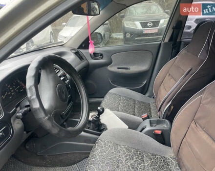 Бежевый Дэу Ланос, объемом двигателя 1.5 л и пробегом 200 тыс. км за 2000 $, фото 4 на Automoto.ua