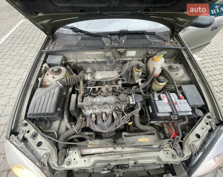 Бежевый Дэу Ланос, объемом двигателя 1.5 л и пробегом 200 тыс. км за 2000 $, фото 8 на Automoto.ua