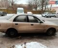 Бежевый Дэу Ланос, объемом двигателя 1.5 л и пробегом 350 тыс. км за 1250 $, фото 2 на Automoto.ua
