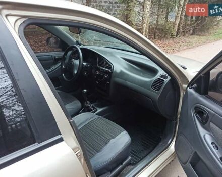 Бежевый Дэу Ланос, объемом двигателя 1.5 л и пробегом 198 тыс. км за 1850 $, фото 13 на Automoto.ua