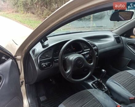 Бежевый Дэу Ланос, объемом двигателя 1.5 л и пробегом 198 тыс. км за 1850 $, фото 12 на Automoto.ua