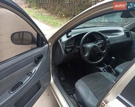 Бежевый Дэу Ланос, объемом двигателя 1.5 л и пробегом 198 тыс. км за 1850 $, фото 4 на Automoto.ua