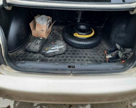 Бежевый Дэу Ланос, объемом двигателя 1.5 л и пробегом 180 тыс. км за 2200 $, фото 9 на Automoto.ua