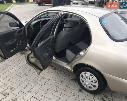 Бежевый Дэу Ланос, объемом двигателя 1.5 л и пробегом 345 тыс. км за 1800 $, фото 1 на Automoto.ua