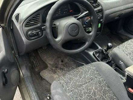 Бежевый Дэу Ланос, объемом двигателя 1.5 л и пробегом 265 тыс. км за 1100 $, фото 1 на Automoto.ua