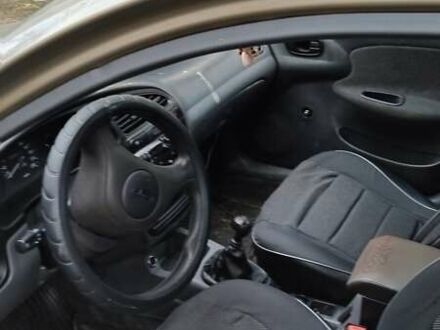 Бежевый Дэу Ланос, объемом двигателя 1.39 л и пробегом 288 тыс. км за 1100 $, фото 1 на Automoto.ua