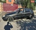 Чорний Деу Ланос, об'ємом двигуна 1.5 л та пробігом 292 тис. км за 1050 $, фото 1 на Automoto.ua