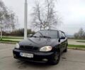 Черный Дэу Ланос, объемом двигателя 1.5 л и пробегом 213 тыс. км за 2600 $, фото 1 на Automoto.ua