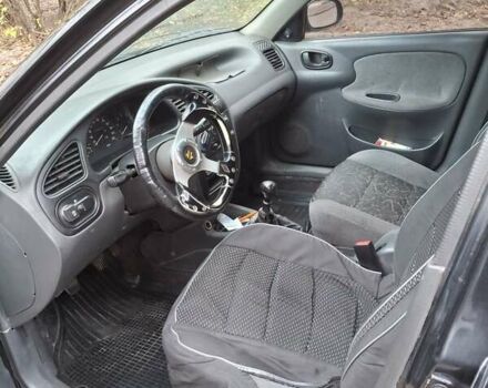 Черный Дэу Ланос, объемом двигателя 1.5 л и пробегом 366 тыс. км за 2300 $, фото 9 на Automoto.ua