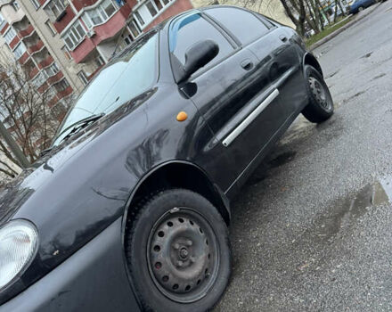 Черный Дэу Ланос, объемом двигателя 1.5 л и пробегом 350 тыс. км за 2450 $, фото 1 на Automoto.ua