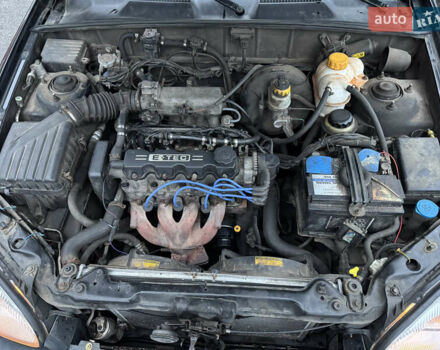 Черный Дэу Ланос, объемом двигателя 1.5 л и пробегом 350 тыс. км за 2450 $, фото 8 на Automoto.ua