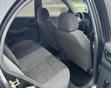 Черный Дэу Ланос, объемом двигателя 1.5 л и пробегом 350 тыс. км за 2450 $, фото 11 на Automoto.ua