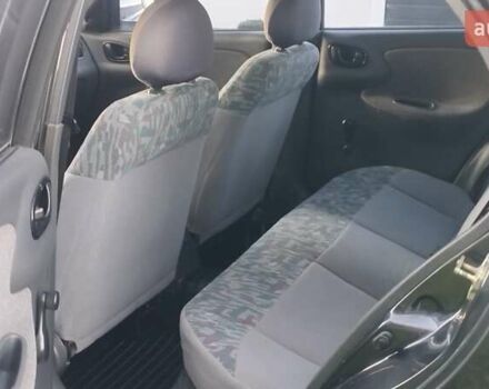 Черный Дэу Ланос, объемом двигателя 1.5 л и пробегом 145 тыс. км за 1950 $, фото 15 на Automoto.ua