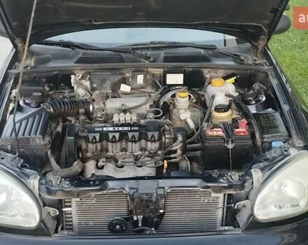 Черный Дэу Ланос, объемом двигателя 1.5 л и пробегом 145 тыс. км за 1950 $, фото 8 на Automoto.ua