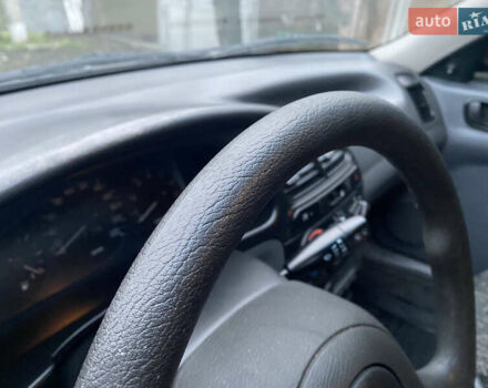 Чорний Деу Ланос, об'ємом двигуна 1.5 л та пробігом 210 тис. км за 3000 $, фото 9 на Automoto.ua