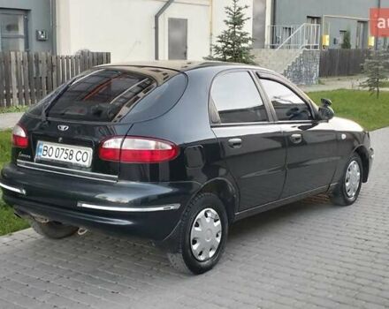 Черный Дэу Ланос, объемом двигателя 1.5 л и пробегом 145 тыс. км за 1950 $, фото 1 на Automoto.ua