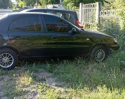 Черный Дэу Ланос, объемом двигателя 1.5 л и пробегом 250 тыс. км за 2300 $, фото 7 на Automoto.ua