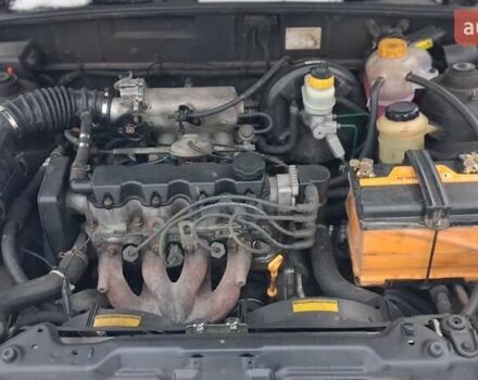 Черный Дэу Ланос, объемом двигателя 1.5 л и пробегом 250 тыс. км за 2300 $, фото 1 на Automoto.ua