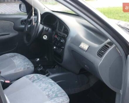 Черный Дэу Ланос, объемом двигателя 1.5 л и пробегом 145 тыс. км за 1950 $, фото 10 на Automoto.ua