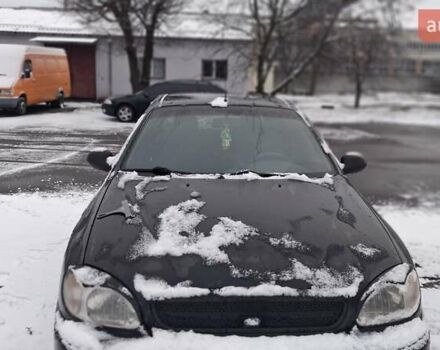 Черный Дэу Ланос, объемом двигателя 1.5 л и пробегом 250 тыс. км за 2300 $, фото 2 на Automoto.ua