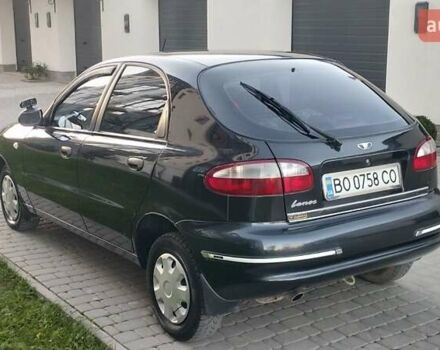 Черный Дэу Ланос, объемом двигателя 1.5 л и пробегом 145 тыс. км за 1950 $, фото 4 на Automoto.ua