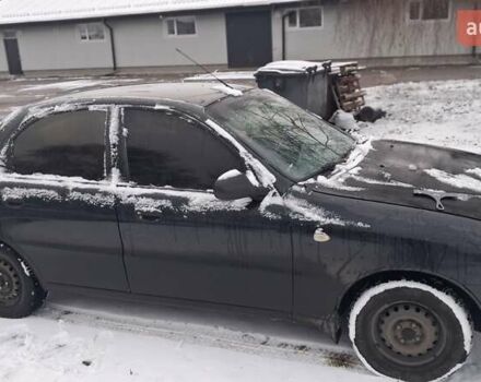 Черный Дэу Ланос, объемом двигателя 1.5 л и пробегом 250 тыс. км за 2300 $, фото 3 на Automoto.ua