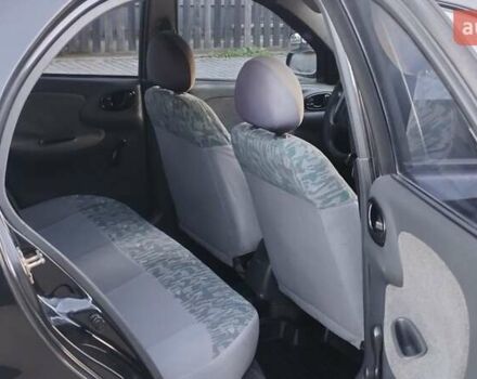 Черный Дэу Ланос, объемом двигателя 1.5 л и пробегом 145 тыс. км за 1950 $, фото 9 на Automoto.ua