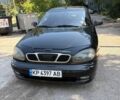 Черный Дэу Ланос, объемом двигателя 1.5 л и пробегом 178 тыс. км за 2000 $, фото 1 на Automoto.ua