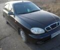 Чорний Деу Ланос, об'ємом двигуна 1.5 л та пробігом 207 тис. км за 2300 $, фото 1 на Automoto.ua