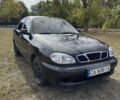Черный Дэу Ланос, объемом двигателя 1.5 л и пробегом 183 тыс. км за 2100 $, фото 1 на Automoto.ua