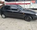 Черный Дэу Ланос, объемом двигателя 1.5 л и пробегом 234 тыс. км за 2900 $, фото 9 на Automoto.ua