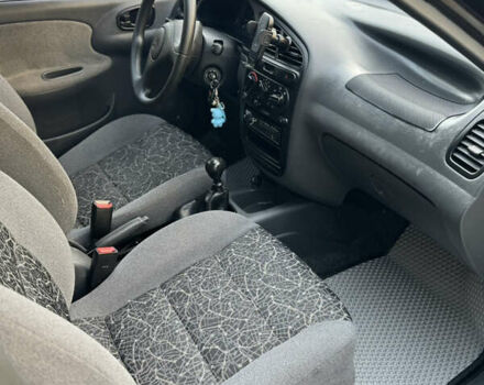 Черный Дэу Ланос, объемом двигателя 1.5 л и пробегом 165 тыс. км за 2700 $, фото 6 на Automoto.ua
