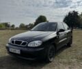 Черный Дэу Ланос, объемом двигателя 1.5 л и пробегом 183 тыс. км за 2500 $, фото 1 на Automoto.ua