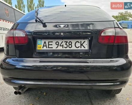 Черный Дэу Ланос, объемом двигателя 1.5 л и пробегом 234 тыс. км за 2900 $, фото 2 на Automoto.ua