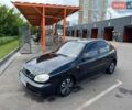 Черный Дэу Ланос, объемом двигателя 1.5 л и пробегом 258 тыс. км за 2300 $, фото 1 на Automoto.ua