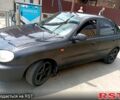 Черный Дэу Ланос, объемом двигателя 1.6 л и пробегом 240 тыс. км за 1800 $, фото 1 на Automoto.ua