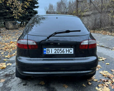 Чорний Деу Ланос, об'ємом двигуна 1.6 л та пробігом 190 тис. км за 2350 $, фото 4 на Automoto.ua