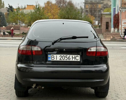 Черный Дэу Ланос, объемом двигателя 1.6 л и пробегом 190 тыс. км за 2650 $, фото 5 на Automoto.ua