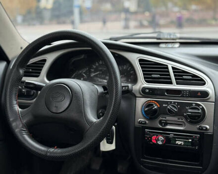 Черный Дэу Ланос, объемом двигателя 1.6 л и пробегом 190 тыс. км за 2650 $, фото 10 на Automoto.ua