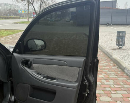 Черный Дэу Ланос, объемом двигателя 1.6 л и пробегом 181 тыс. км за 2350 $, фото 6 на Automoto.ua