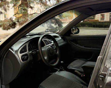 Деу Ланос 2009 у Запоріжжя на Automoto.ua Чорний Деу Ланос, об'ємом двигуна 1.6 л та пробігом 180 тис. км за 2650 $, фото 9 на Automoto.ua