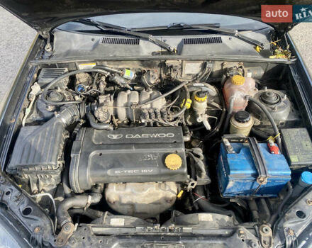 Дэу Ланос 2009 в Запорожье на Automoto.ua Черный Дэу Ланос, объемом двигателя 1.6 л и пробегом 180 тыс. км за 2000 $, фото 13 на Automoto.ua