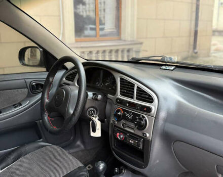 Деу Ланос 2009 у Запоріжжя на Automoto.ua Чорний Деу Ланос, об'ємом двигуна 1.6 л та пробігом 180 тис. км за 2650 $, фото 7 на Automoto.ua