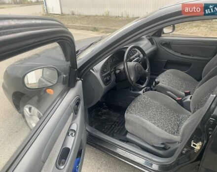 Черный Дэу Ланос, объемом двигателя 1.5 л и пробегом 96 тыс. км за 2900 $, фото 14 на Automoto.ua