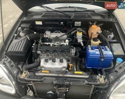 Черный Дэу Ланос, объемом двигателя 1.5 л и пробегом 96 тыс. км за 2900 $, фото 22 на Automoto.ua