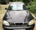 Черный Дэу Ланос, объемом двигателя 1.5 л и пробегом 100 тыс. км за 2000 $, фото 1 на Automoto.ua