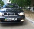 Черный Дэу Ланос, объемом двигателя 1.5 л и пробегом 57 тыс. км за 4700 $, фото 1 на Automoto.ua